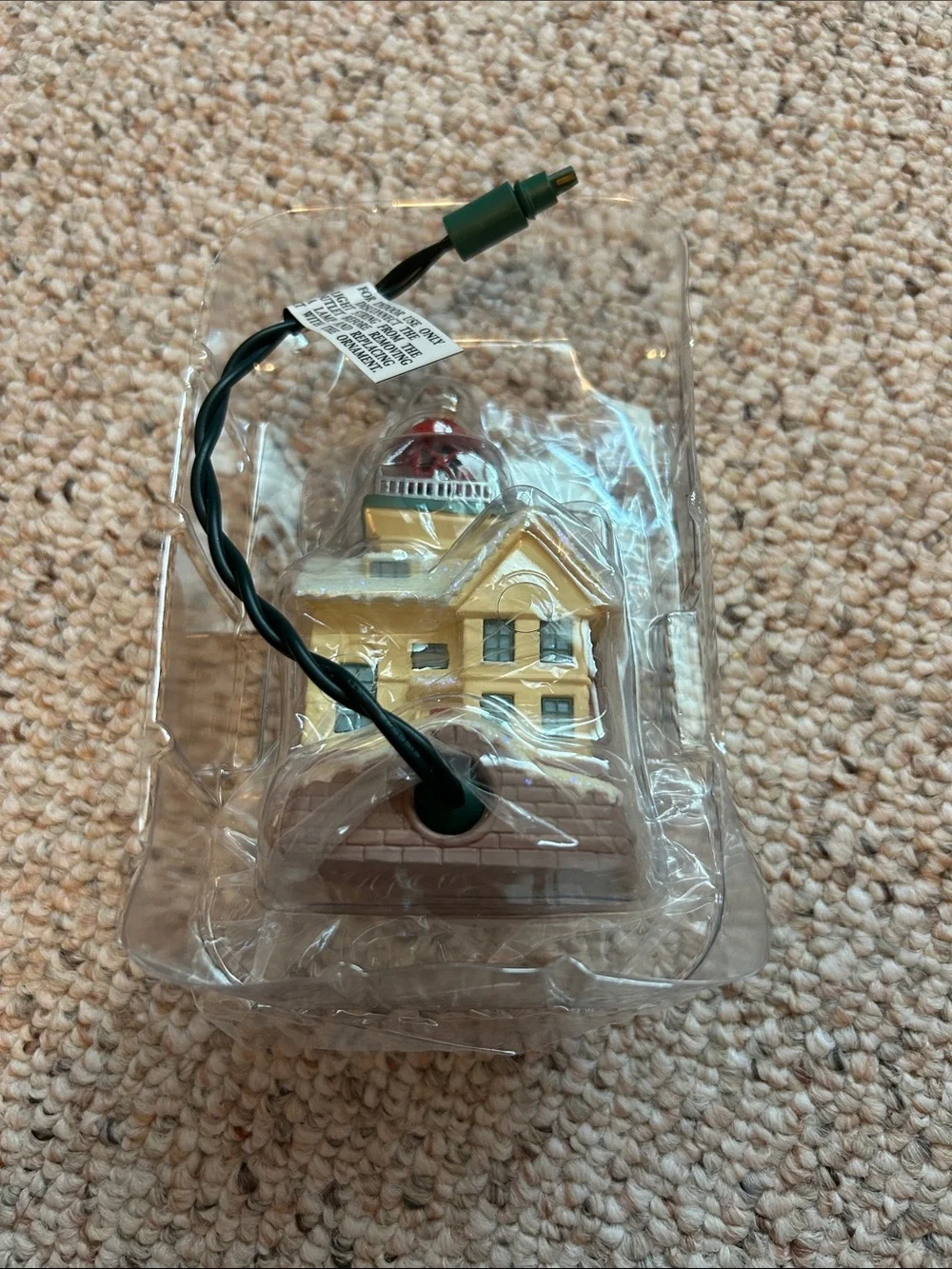 2004 Hallmark Lighthouse Greetings Ornament with flashing magic light.